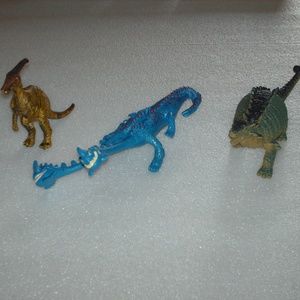 Bundle of old children's dinosaur toys